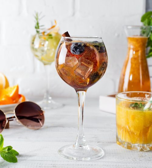 a-glass-of-cocktail-and-a-glass-with-an-orange-cocktail-or-fresh-and-tonic.jpg